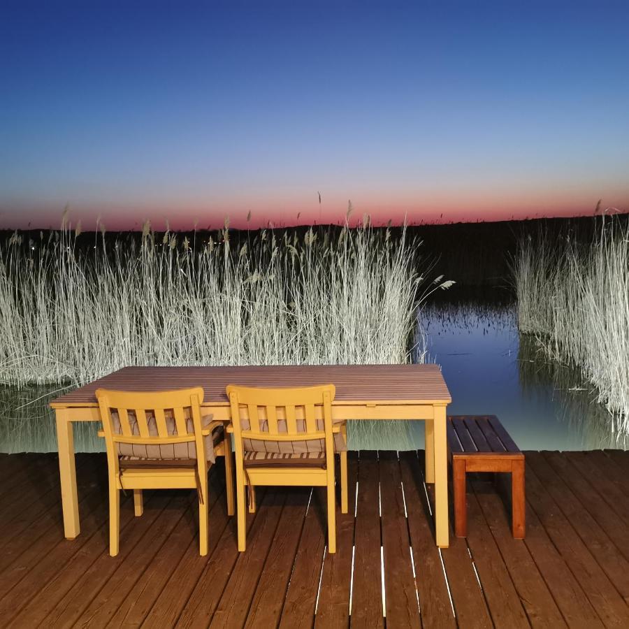 Pfahlbau Sunset II Toplage Inklusive Elektroboot Rust Bagian luar foto